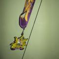Disney Jewelry | Disney Wdw 2012 Tangled Royal Family 5k Metal Mar | Color: Purple/Yellow | Size: Os