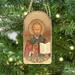 The Holiday Aisle® Inspirational Icon Saint Nicholas Wooden Photo Ornament Wood in Brown/Red | 5 H x 3.5 W x 0.75 D in | Wayfair 87021