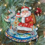 The Holiday Aisle® Deco Santa on Elephant Hanging Wood Ornament Wood in Blue/Brown/Red | 5 H x 5.5 W x 0.3 D in | Wayfair 8111380