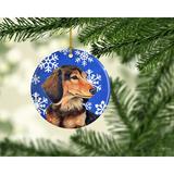 The Holiday Aisle® Dachshund Winter Snowflake Holiday Hanging Figurine Ornament /Porcelain in Black/Blue/Brown | 3 H x 3 W x 0.25 D in | Wayfair
