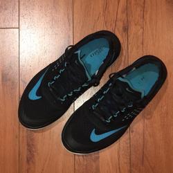 Nike Shoes | Black With Blue Nike Sneakers In Good Condition | Color: Black/Blue | Size: 10