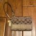 Coach Bags | Brown And Gold Small Coach Wristlet. | Color: Brown/Gold | Size: Os