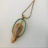 Anthropologie Jewelry | Anthropologie 2 Charms Turquoise Stones Necklace Pendant Gold Tone Long Chain | Color: Blue/Gold | Size: Os