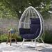 Dakota Fields Trella Egg Patio Chair w/ Cushion Wicker/Rattan in Blue/White | 61.4 H x 39.76 W x 35.04 D in | Wayfair