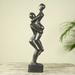 World Menagerie Cailynn Romantic Wood of Man & Woman Sculpture Wood in Black/Brown | 17.3 H x 3.9 W x 2.4 D in | Wayfair 231909
