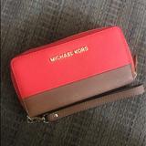 Michael Kors Bags | Michael Kors Jet Set Travel Wallet | Color: Brown/Orange | Size: Os