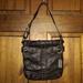 Coach Bags | Coach Black Leather Soho Slim Duffle Shoulder Bag | Color: Black | Size: Os