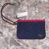 Dooney & Bourke Bags | Dooney And Bourke Clutch. Nwt | Color: Blue/Orange | Size: Os