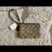 Coach Bags | Coach Signature Corner Zip Wristlet | Color: Brown/Tan | Size: Os