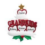 The Holiday Aisle® Family of 4 Grandkids Hearts Holiday Shaped Ornament Plastic in Green/Red/Yellow | 4 H x 3 W x 0.5 D in | Wayfair