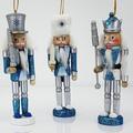 The Holiday Aisle® 3 Piece Snow Fantasy Nutcracker Hanging Figurine Ornament Set Ceramic/Porcelain in Blue/Gray | 5 H x 2 W x 2 D in | Wayfair
