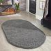 Gray 60 x 1.5 in Area Rug - Ebern Designs Lanzilotta Machine Made Shag Graphite Rug Polypropylene | 60 W x 1.5 D in | Wayfair