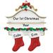 The Holiday Aisle® Couple Stocking Holiday Shaped Ornament Plastic in Green/Red | 4.25 H x 3.75 W x 0.5 D in | Wayfair