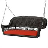 Jeco Wicker Porch Swing in Espresso with Red Cushion