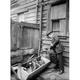 New York: Tenement C1910. /Na Public Health Inspector Identifying Mosquito Breeding Areas In The Backyards Of Tenement Buildings In An
