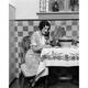 1920s Woman Sitting At Kitchen Table With Table Cloth While Smiling On Phone Print By Vintage Collection