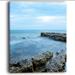 Design Art Blue Rocky Seashore Photographic Print on Wrapped Canvas