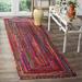 Orange/Red 27 x 0.3 in Area Rug - Langley Street® Fiqueroa Hand-Knotted Cotton Red/Orange/Yellow Area Rug Cotton | 27 W x 0.3 D in | Wayfair