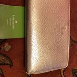 Kate Spade Bags | Kate Spade Gold Zip Around Wallet | Color: Gold/Tan | Size: Os