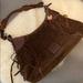 Dooney & Bourke Bags | Dooney & Burke Chocolate Suede Fringe Hobo | Color: Brown/Red | Size: Os