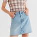 Urban Outfitters Skirts | Bdg Light Wash Raw Hem Denim Jean Mini Skirt M | Color: Blue | Size: M