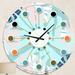 East Urban Home Retro Floral Pattern II - Mid-Century Modern wall clock Metal in Blue/Orange | 23 H x 23 W x 1 D in | Wayfair