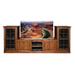 Loon Peak® Nance Solid Wood TV Stand for TVs up to 60" Wood in Brown | 24 H in | Wayfair 6726F66683AB45229ACECC692E50ED79