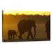 East Urban Home Africa 'African Elephant Mother & Calf Silhouetted at Sunset' - Photograph Print on Canvas in Black/Orange | Wayfair