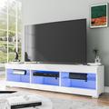 Wade Logan® Guertin TV Stand for TVs up to 65", Media Console w/ RGB LED Lights Wood/Glass in White | 13 H in | Wayfair