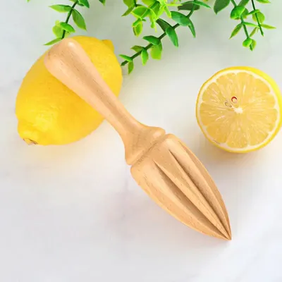 Presse-citron en bois en forme d...