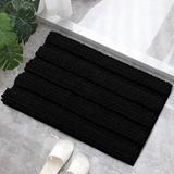 Ebern Designs Faddis Soft Striped Rectangle Absorbent Non-Slip Bath Rug Polyester in Black | 1 H x 24 W in | Wayfair
