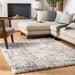 Calsib 6'7" x 9' Modern Shag Plush Bohemian Cream/Light Gray/Black/Light Beige/Peach Area Rug - Hauteloom