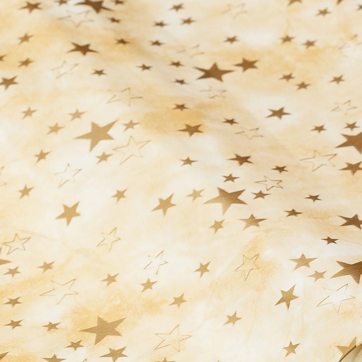 Nappe épongeable - toile cirée "étoiles", crème/doré