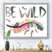 East Urban Home Be wild Indian Tribal Feathers - Graphic Art Print on Canvas Metal in Brown/Green/Red | 24 H x 32 W x 1 D in | Wayfair