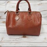 Louis Vuitton Bags | Louis Vuitton Speedy 25 Epi Leather Brown Satchel | Color: Brown/Tan | Size: Os