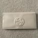 Gucci Bags | Gucci Patent Leather Logo Wallet | Color: Cream/Tan | Size: Os