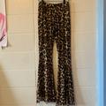 American Eagle Outfitters Pants & Jumpsuits | Animal Print Flared Leggings | Color: Black/Brown | Size: M