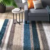 Black/Blue 84 x 0.91 in Area Rug - Langley Street® City Striped Shag Tufted Performance Brown/Teal/Blue Rug Polypropylene | 84 W x 0.91 D in | Wayfair