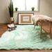 Green 96 x 2.5 in Area Rug - Etta Avenue™ Dominick Mint Faux Fur Shag Fluffy Area Rug Faux Fur | 96 W x 2.5 D in | Wayfair