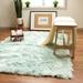 Blue/Green 60 x 2.5 in Area Rug - Etta Avenue™ Dominick Teal Faux Fur Shag Fluffy Area Rug Faux Fur/Polyester | 60 W x 2.5 D in | Wayfair