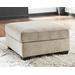 Signature Design by Ashley Decelle 37" Wide Square Standard Ottoman w/ Storage Polyester in Brown | 20 H x 37 W x 37 D in | Wayfair 8030508