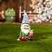 August Grove® Ember Cheery Gnome Solar Statue Resin/Plastic in Blue/Green/Red | 7.25 H x 4 W x 4 D in | Wayfair FF45D46BEB1A490480A00C519D5DD229
