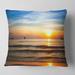 Designart 'Fascinating Sunset Over Clam Beach' Modern Beach Throw Pillow