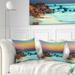 Designart 'Sunset Over Blue Sky' Seascape Photography Throw Pillow