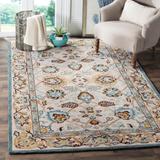 SAFAVIEH Handmade Antiquity Amber Traditional Oriental Wool Rug