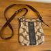 Coach Bags | Coach Crossbody In Brown Logo Print | Color: Brown/Tan | Size: Os