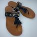 Coach Shoes | Coach Sheena Black Leather Tassel Sandals | Color: Black/Gold | Size: 7.5