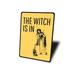 Lizton Sign Shop, Inc Witch Is In Sign Metal in Black/Yellow | 14 H x 10 W x 0.04 D in | Wayfair 2985-A1014