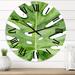 Designart 'Green Monstera Leaf Tropical Palm Botanical Detail' Tropical wall clock