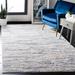 Blue/White 96 x 0.43 in Indoor Area Rug - Highland Dunes Granada Abstract Ivory/Blue Area Rug | 96 W x 0.43 D in | Wayfair